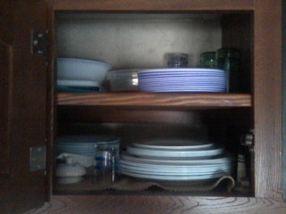 additional shelf in kitchen cupboard