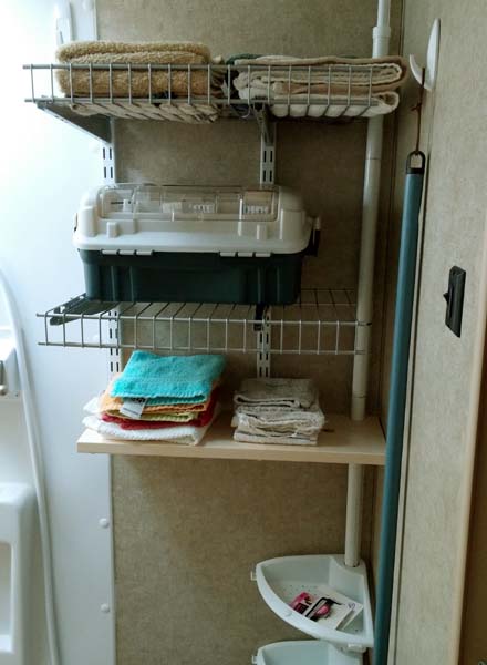 Adjustable shelves above toilet for towels, wash clothes, and first aid kit. Also have suspension shelves for shower in corner for girls hair supplies