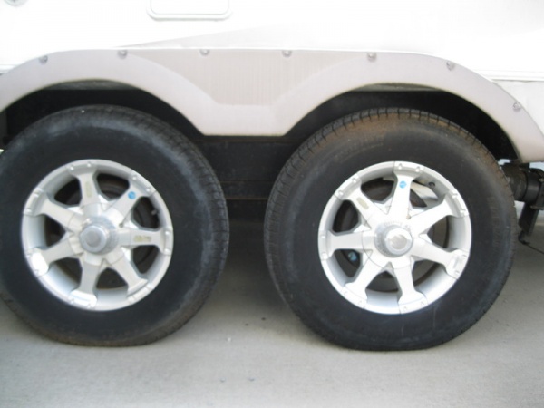 Aluminum wheels with tandem torsion axles