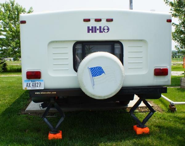 Back of M2405T - spare tire and cover, out door storage