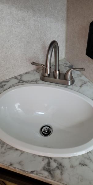 Bathroom Faucet - Replaced the original with a faucet that extends further into the sink.