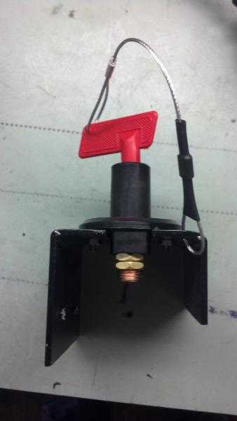 Battery Isolator switch mounted to plexiglas and key held on with cable to plexiglas