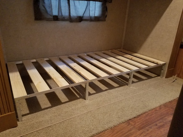 Bed frame in bunk room