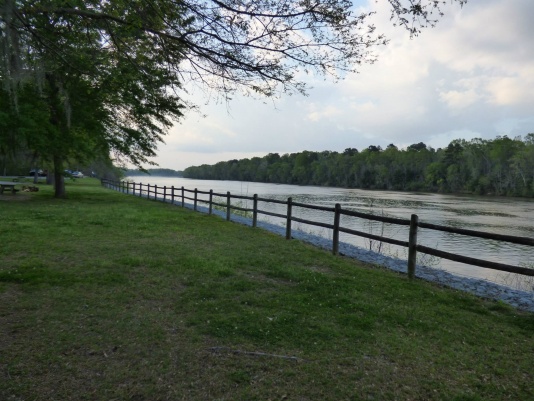 Behind the trailer looking North up the river.