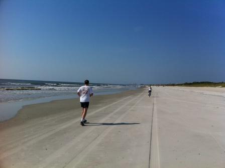 Bike ride on beach.  Lucille up ahead.