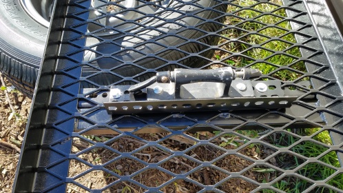 Bike Tight fork clamp mounted with two pieces of metal angle to reinforce the screen decking.