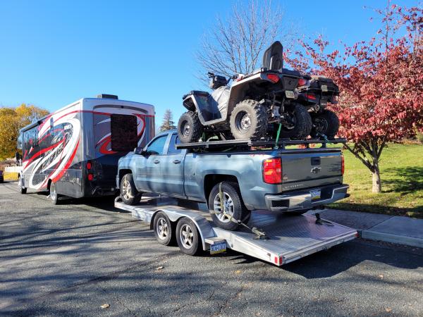 Both atvs on truck deck