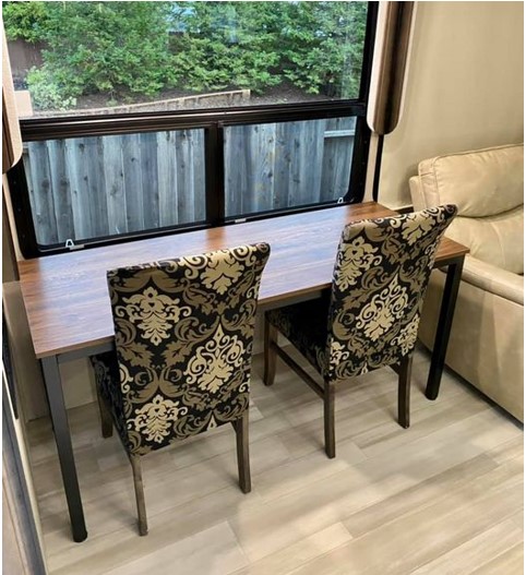 Bought this table off of Amazon.  It fits perfectly. We love sitting this way as there is more room, we can look out the window better, table and  isl