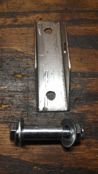 Bracket and bolt with sleeve