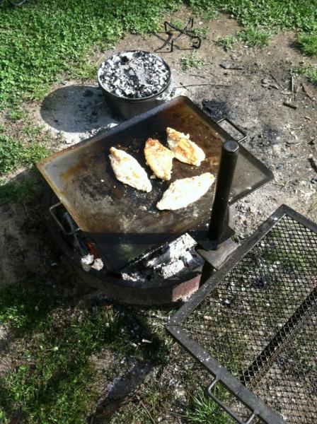 Breaded fresh catfish on the campfire.