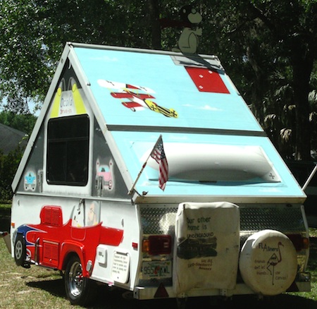 Bubble window painted to resemble a dirigible. Red Baron is flying the tri-wing.