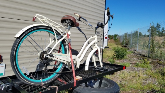 Bulky beach cruiser mounted. Mountain bikes nest just fine across the front of the truck bed but the beach cruiser is better handled on the rack. I wi