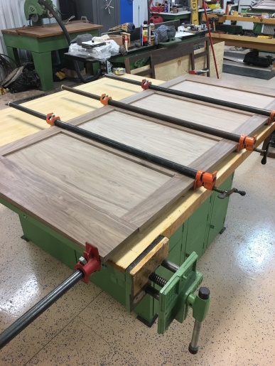 cabinet panels glued and clamped, this 4 panel unit is the back panel for the island cook-top.