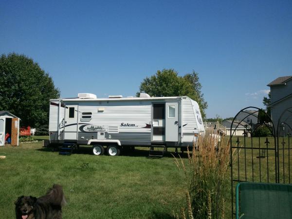 Camper and...silly dog in the pic. He's nothing but an attention 'ho'.