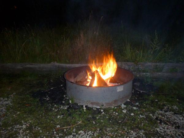 campfire near the rocky mountains