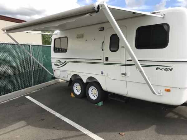 Carefree awning, supports can unhook from body and be vertical