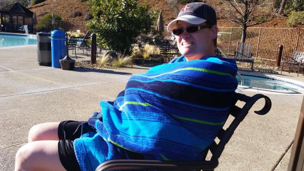 Cassie really chilling by the hot tub. It's in the 40's.