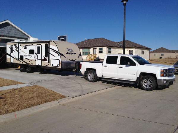 Checking to see if this beast fits in the driveway