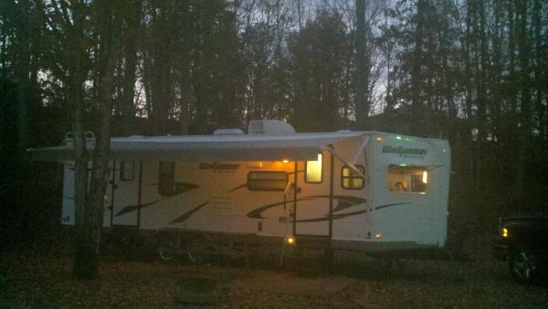 Cherokee NC Camp Ground after dark; Wife waving in front window