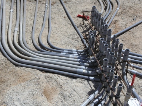 Closer view of conduits terminaton, the 4 sub panels sit above this location.