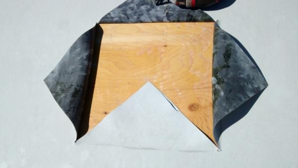 Cut EPDM roofing material.