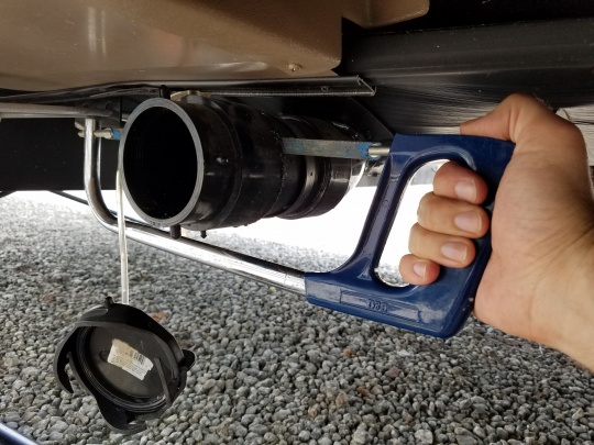 Cutting of the old bayonet connector from the front bathroom black/gray tank drain