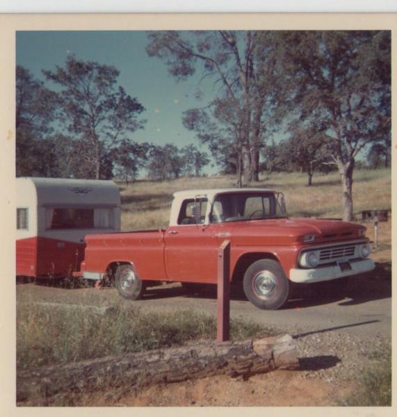 Dad's old Chevy with the camper hooked up. I think it was a Shasta. There was 6 of us loaded up in the pickup. And yes some in the bed. I slept in a h