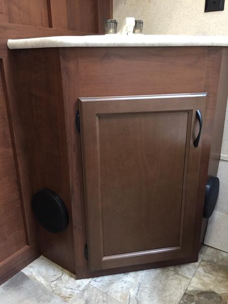 DH wanted speakers in the bathroom, so he mounted them on both sides of the sink cabinet.