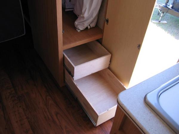 Drawers added to lower section of closet. We hang shirts in the upper section. Really, we do!