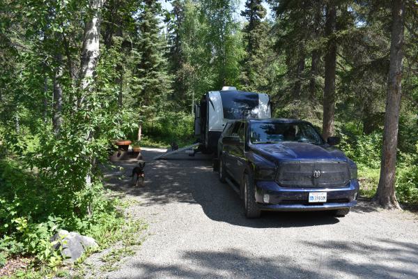 Dry camping.  Sites have plenty of room.  Staff rake the gravel between campers - there was no trash anywhere in the site.  That's Luna posing for the