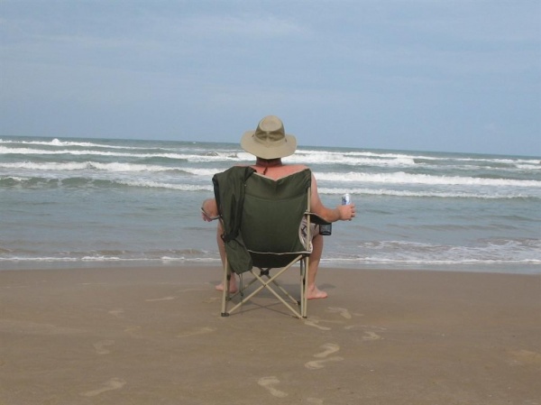 Dutch on beach in South Padre, singing...

Got my ass in a lawn chair, toes in the sand,
Not a worry in the world, a cold beer in my hand,
Life is goo