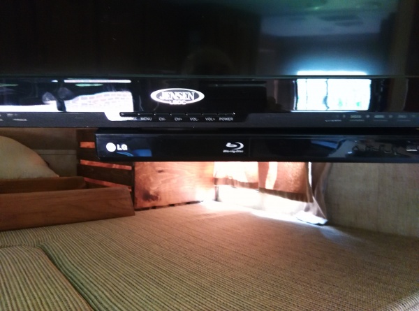 DVD player installed under TV