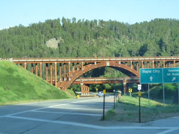 East gateway into Custer State Park and passes through parts of Black Hills National Forest and Mt. Rushmore National Monument.  One of many wooden br