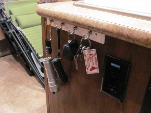 Easy key/flashlight holder. Just inside the door for easy access.