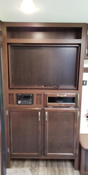 Entertainment Center Before - This is the entertainment center with the rotating TV mount.  We have never had a TV in one of our RV's so we did not se