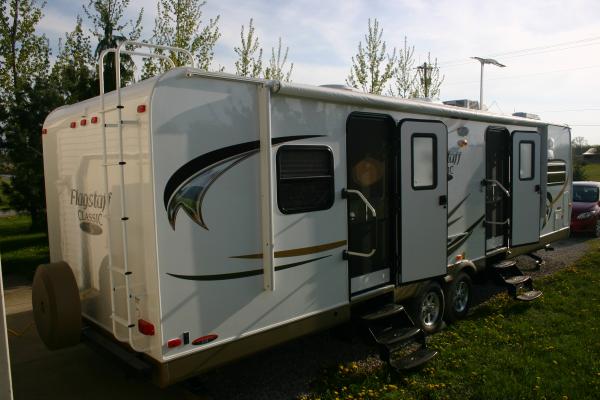 Exterior View From Rear
(Rear Ladder & Power Awning Visible)