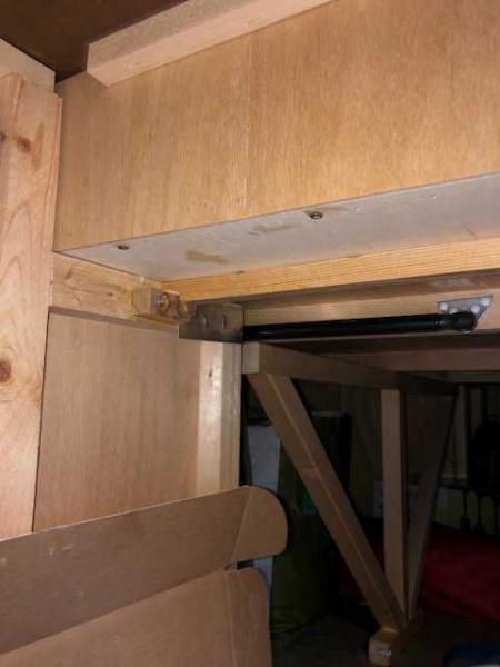 False Sides -
the queen bed has ledges upper right and left to support the bed from the lift system. Do NOT use these ledges to push yourself up while