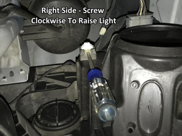 Finally figured out how to adjust my headlights. There are (2) plastic white Philips slots - easy as pie. Originally too scared to mess with them