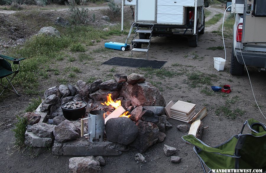 Fire pit with dutch oven action