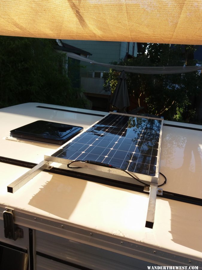 Flexible solar panel mounted to the roof