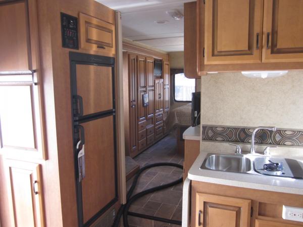 Fridg and side pantry cabinets.  The side pantry cabinets do not have a lot of storage area.  I have my spices stacked on "skinny" racks.  Hard to fin