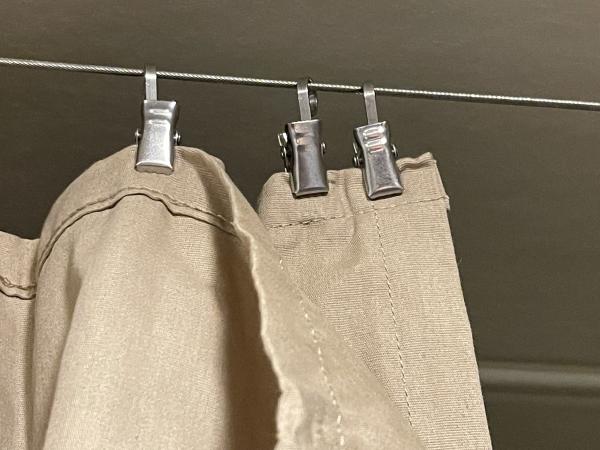 Front bunk curtain - hangers and showing "curtain" (flat sheet, probably a queen) doubled-up