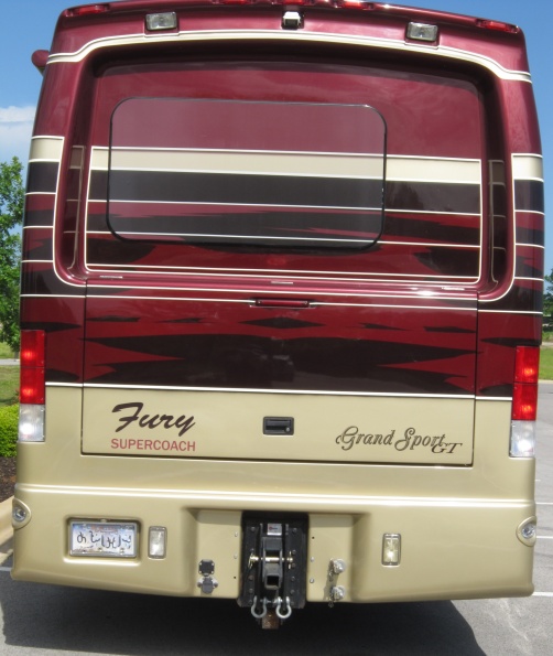 Fury. Note Fury name badge, 40,000 lb rated hitch, air line hookups (so-called Glad Hands), & 2 different electrical hookups for towed vehicles.