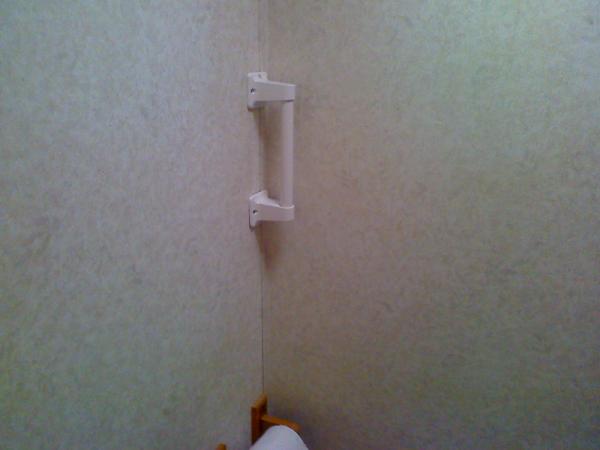 Grab Handle for my One Legged Buddy that camps with me a lot, Helps to get off the commode, especially after installing the 2 1/2" riser under commode