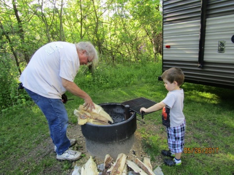 Grandpa and Ryan with setting up the fire pit for the evening.