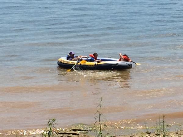 "Grands" with grandpa on the lake close to camping spot.