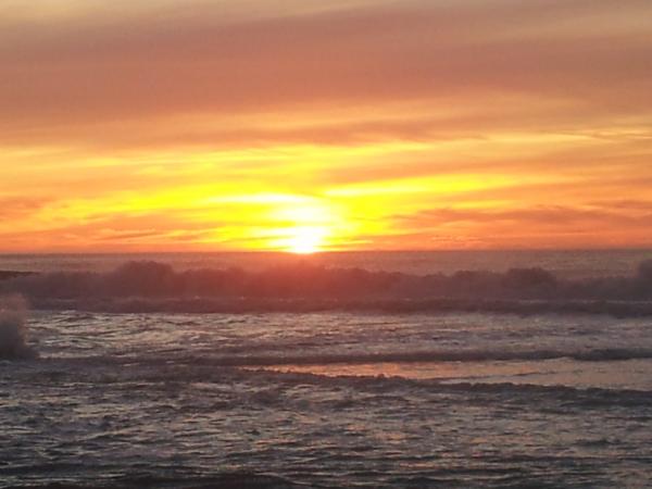 Half moon bay at sunset