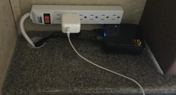 HDMI and power strip by dinette TV