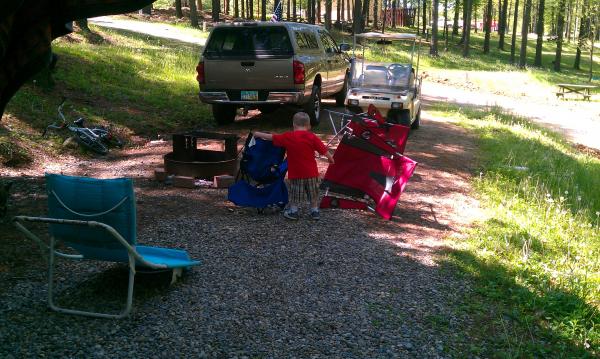 Helping grandpa by turning all of the chairs over....LOL