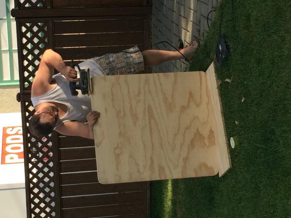 Here's hubby making our new dinette table out of 3/4" plywood.  The dimensions are 32"x36".  There is another 3/4" plywood piece that will stay flat a